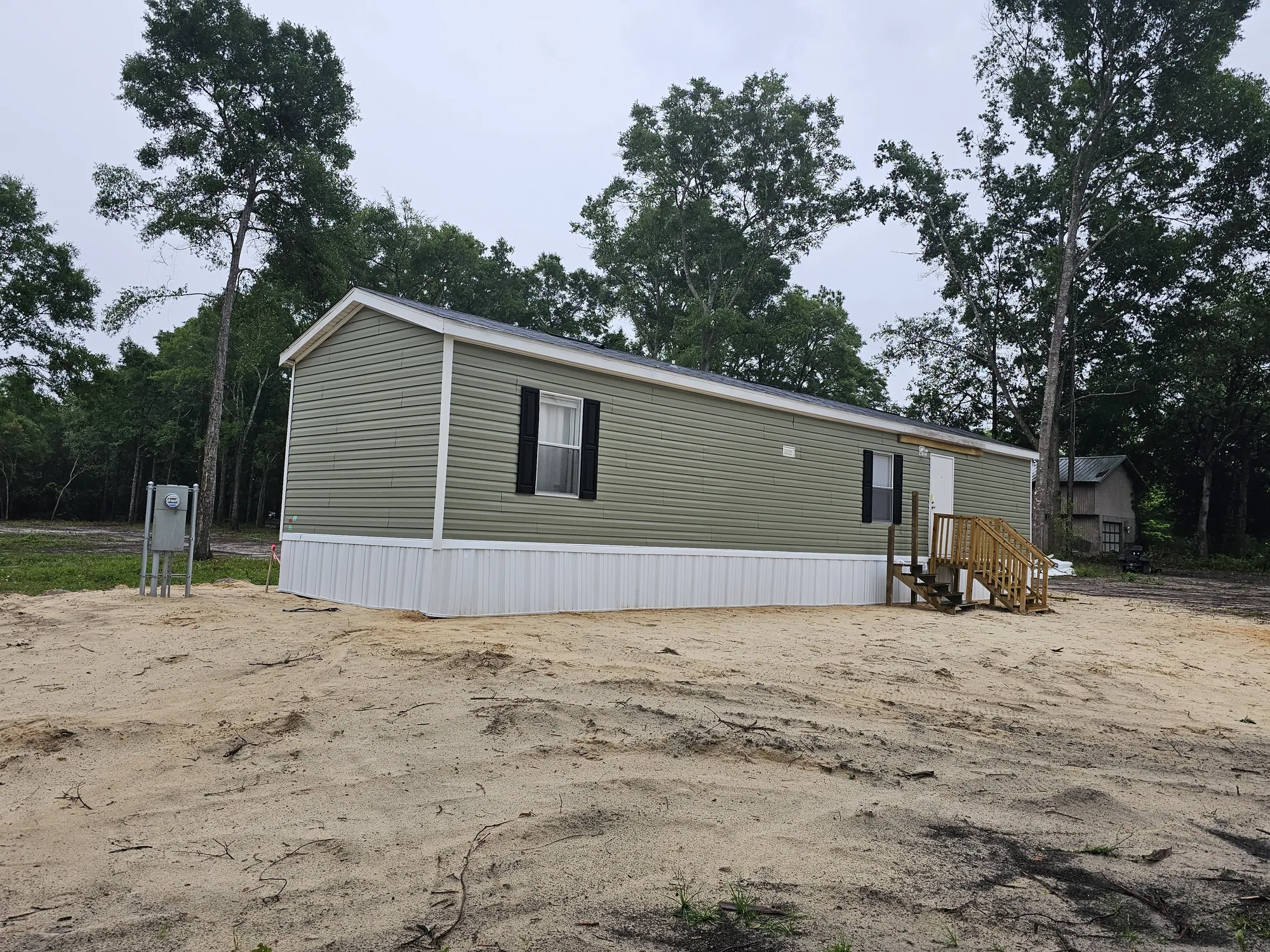 Completed mobile home site prep on a cleared Florida property